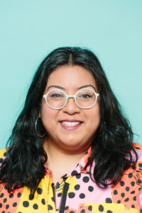 Brenda Hernandez on a blue background